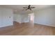 Open-concept living space featuring wood floors and staircase at 1371 Cumulus Ct, Henderson, NV 89014