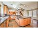 Spacious kitchen with a large island, stainless steel appliances, and tile flooring at 1737 Cypress Manor Dr, Henderson, NV 89012