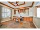 Cozy office featuring a built-in desk, shelving, and plenty of natural light at 1737 Cypress Manor Dr, Henderson, NV 89012