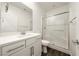 Modern bathroom featuring a glass-enclosed shower and a sleek vanity with contemporary fixtures at 175 Strada Fontana, Henderson, NV 89011