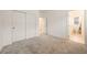 A bedroom offers a closet and access to a full ensuite bathroom at 175 Strada Fontana, Henderson, NV 89011