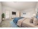 Spacious main bedroom featuring a walk-out, and a stylish dresser with flat screen TV at 175 Strada Fontana, Henderson, NV 89011