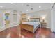 Spacious bedroom features hardwood floors and custom built-in cabinet and shelves at 1809 White Hawk Ct, Las Vegas, NV 89134