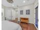 Bedroom featuring hardwood floors, a ceiling fan, and natural light at 1809 White Hawk Ct, Las Vegas, NV 89134