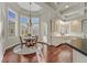 Charming breakfast nook with ample natural light and a cozy chandelier at 1809 White Hawk Ct, Las Vegas, NV 89134