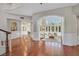Open floor plan from the foyer into the living room with high ceilings and natural light at 1809 White Hawk Ct, Las Vegas, NV 89134