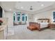 Beautiful main bedroom with a sitting area, tray ceiling and gorgeous carpet at 1809 White Hawk Ct, Las Vegas, NV 89134