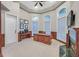 Spacious office area with hardwood trim, fireplace and large windows at 1809 White Hawk Ct, Las Vegas, NV 89134