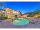 Luxurious backyard featuring a stunning pool, spa, lush landscaping, and ample patio space at 1809 White Hawk Ct, Las Vegas, NV 89134
