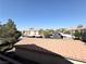 Residential area with red-tiled rooftops, mature trees, and plenty of parking available at 1881 W Alexander Rd # 2129, North Las Vegas, NV 89032