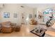 Spacious living room with hardwood floors, archways, and a comfortable seating area at 1913 Madagascar Ln, Las Vegas, NV 89117