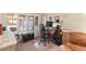 Inviting office with natural light and a comfortable armchair to relax in at 1913 Madagascar Ln, Las Vegas, NV 89117