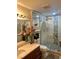 Modern bathroom with a glass-enclosed shower and stone accents at 200 W Sahara Ave # 3510, Las Vegas, NV 89102
