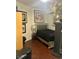 Cozy bedroom with dark wood floors and stylish furnishings at 200 W Sahara Ave # 3510, Las Vegas, NV 89102