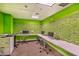 Bright office space featuring tiled wall and computer stations for residents to enjoy at 200 W Sahara Ave # 3510, Las Vegas, NV 89102
