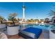 Outdoor pool with city views featuring trees and lounge chairs for relaxing by the pool at 200 W Sahara Ave # 3510, Las Vegas, NV 89102