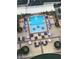 Aerial view of the pool area featuring lounge chairs, tables, and a vibrant blue pool perfect for relaxing in style at 200 W Sahara Ave # 3510, Las Vegas, NV 89102