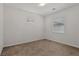Bedroom featuring carpet, windows, and natural light at 209 Bellini Peak Ave, Henderson, NV 89011