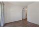 Bedroom with wood floor and entry to bathroom at 209 Bellini Peak Ave, Henderson, NV 89011