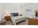 Comfortable primary bedroom features a queen bed with end tables and natural light at 209 Bellini Peak Ave, Henderson, NV 89011