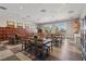 Community room with multiple tables and chairs, interior lockers, and tile flooring at 209 Bellini Peak Ave, Henderson, NV 89011