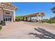 Beautiful exterior view of a community building showcasing the covered entrance and well-maintained landscaping at 209 Bellini Peak Ave, Henderson, NV 89011
