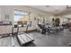 Well-equipped fitness center with treadmills, ellipticals, and weights, promoting an active lifestyle at 209 Bellini Peak Ave, Henderson, NV 89011