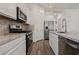 Well-equipped kitchen with stainless steel appliances, granite counters, and ample storage space at 209 Bellini Peak Ave, Henderson, NV 89011