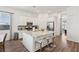 Open kitchen with granite counters, stainless steel appliances, and a large island at 209 Bellini Peak Ave, Henderson, NV 89011