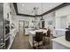 Gourmet kitchen featuring a large island, modern appliances, and plenty of counter space at 209 Bellini Peak Ave, Henderson, NV 89011