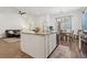 Bright, open-concept kitchen with granite countertops and stainless steel appliances at 209 Bellini Peak Ave, Henderson, NV 89011