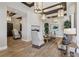 Chic living area featuring a modern fireplace, comfortable seating, and contemporary decor at 209 Bellini Peak Ave, Henderson, NV 89011