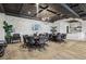 Inviting meeting room featuring round tables, comfortable seating, and unique accent walls, perfect for collaboration at 209 Bellini Peak Ave, Henderson, NV 89011