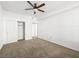 Cozy bedroom offering neutral carpet, a ceiling fan and double door closet at 231 W Horizon Ridge Pkwy # 212, Henderson, NV 89012