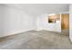 Spacious living room showcasing the entry and access to the kitchen at 231 W Horizon Ridge Pkwy # 212, Henderson, NV 89012