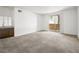 Neutral living area with a slider to the back patio at 231 W Horizon Ridge Pkwy # 212, Henderson, NV 89012