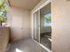 Outdoor patio space with sliding glass door and a storage closet at 231 W Horizon Ridge Pkwy # 212, Henderson, NV 89012