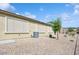 Low maintenance backyard with desert landscaping and privacy shades at 2453 Vivid Sky Pl, Henderson, NV 89044