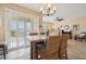 Bright dining area with shutters and views of the outdoors at 2453 Vivid Sky Pl, Henderson, NV 89044