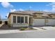 Inviting single-story home showcasing well-maintained landscaping and a cozy front facade at 2453 Vivid Sky Pl, Henderson, NV 89044
