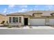 Charming single-story home featuring a two-car garage and low-maintenance landscaping at 2453 Vivid Sky Pl, Henderson, NV 89044