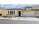 Lovely single-story residence displaying an attached garage and tidy front yard at 2453 Vivid Sky Pl, Henderson, NV 89044