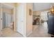 Inviting view of the house displaying the transition between the entry and living spaces at 2453 Vivid Sky Pl, Henderson, NV 89044