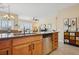 Kitchen island with a view of an open-concept living space at 2453 Vivid Sky Pl, Henderson, NV 89044