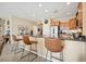 Kitchen with stainless steel appliances, granite counters and bar seating at 2453 Vivid Sky Pl, Henderson, NV 89044