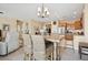 Open concept living area with kitchen and dining space at 2453 Vivid Sky Pl, Henderson, NV 89044
