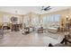 Open-concept living room featuring a dining area and comfortable seating at 2453 Vivid Sky Pl, Henderson, NV 89044