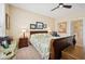 Comfortable primary bedroom with a ceiling fan and traditional furnishings at 2453 Vivid Sky Pl, Henderson, NV 89044