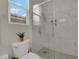Bathroom showcases a modern tiled shower with glass door and neutral finishes at 2633 Spider Cactus Ct, Las Vegas, NV 89106