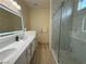 Modern bathroom with a dual sink vanity, a frameless glass shower, and modern fixtures at 2633 Spider Cactus Ct, Las Vegas, NV 89106